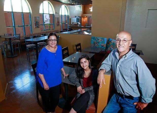 The family together in the dining room of Angela's Eatery